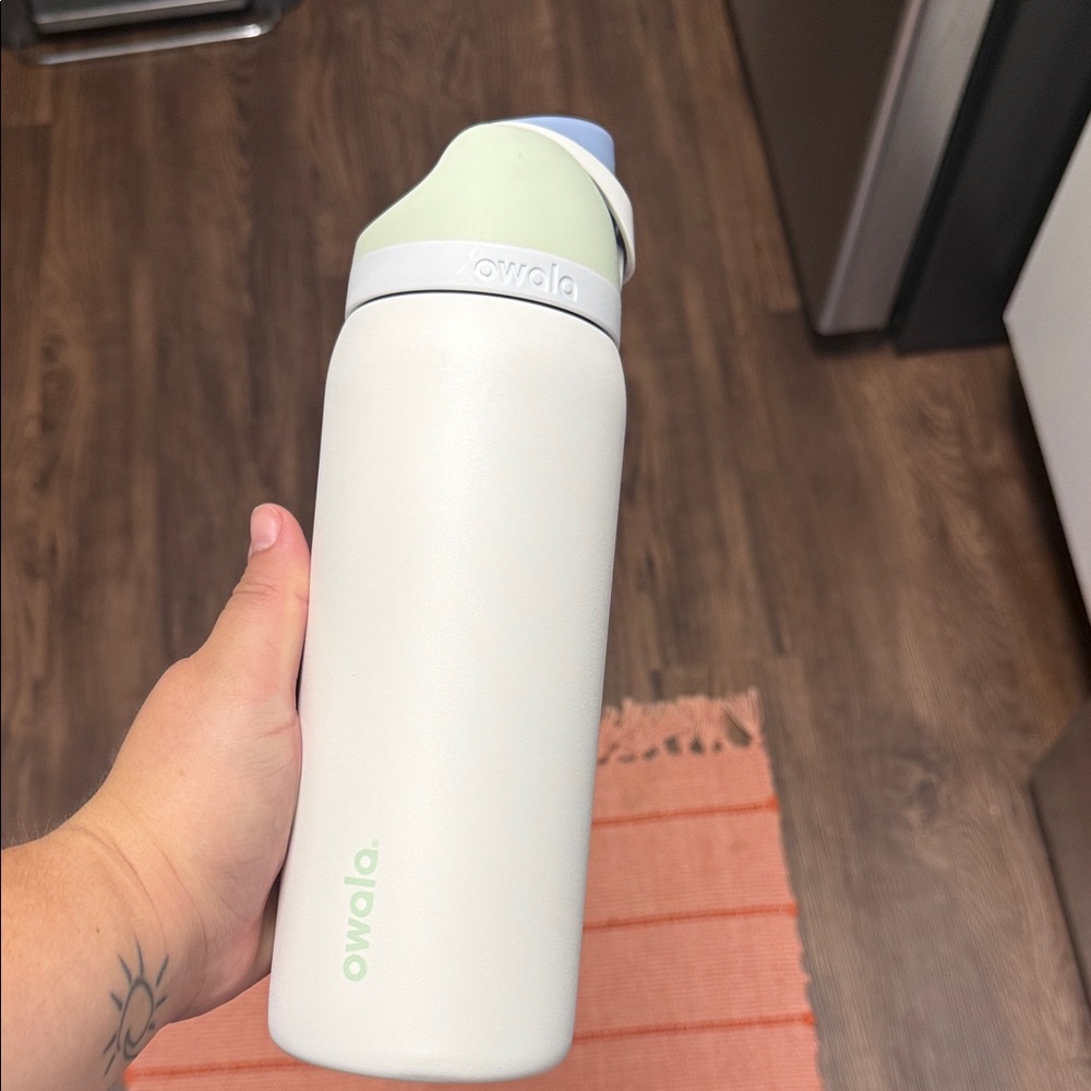 Owala White Water Bottle with Green Lid